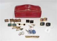 Quantity of cufflinks in a leather jewellery box
