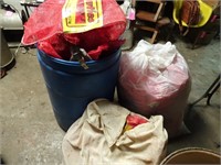 Hundreds of Vegetable Sacks and Plastic Barrel