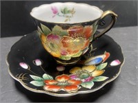 Small Tea Cup and Saucer. Approx. 5” diameter.