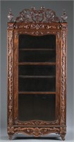 Victorian heavily carved cabinet. 19th century.