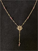 14K gold with amethyst color stones necklace.