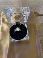 pre owned engagement ring in lucite box