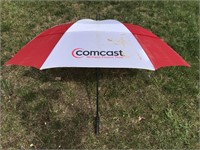 Red and white Comcast umbrella