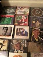 Box of varied genre CDs