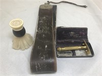 Men’s old school shaving tools. Strop, razor,