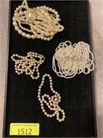 4 pearl necklaces