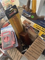 Box lot of hammers, matches, measuring stick,