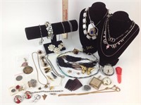 Assorted costume jewelry (necklace, pins, clip-on