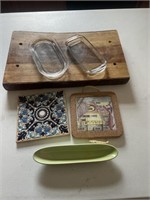 Wood cutting board, butter dishes, potholders