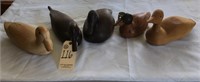 collection of 5 wooden ducks and prints