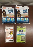 Group of Pet items- training pads, muzzle, and