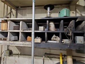 Miscellaneous items and metal on shelf/catwalk