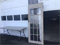 ANTIQUE GLASS PANELED DOOR