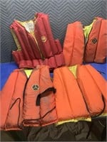 4 adult life jackets   (at#26b