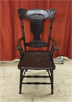 Vintage wooden captains chair.