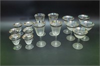 Sixteen-piece crystal stemware with silvered rims