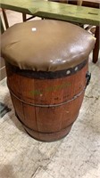 Vintage powder keg stool with a vinyl padded seat