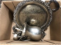 Box of silver plated water pitcher.
