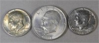 Eisenhower Dollar and (2) Kennedy Halves.