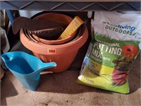 Garden supplies, flower pots, potting soil,