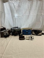 Lot Of 4 Cameras And Accessories