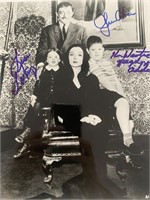 The Addams Family cast signed photo. GFA Authentic