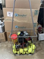 Metal carrying basket with tennis balls