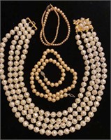 Faux pearl necklaces