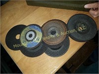 Metal ammo box with lots of grinding wheels