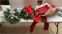 Christmas wreaths and assorted large bows