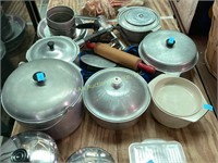 Aluminum pots and pans and pie plates.  Litter