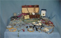 Large box of vintage and modern costume jewelry