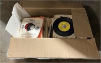 Box of 45 RPM Vinyl Records.