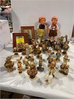 LARGE GROUP OF HUMMEL FIGURINES (SOME HAVE