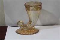 An Iridescent Carnival Glass Cup
