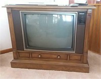 Magnavox  24" TV in wood cabinet