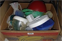 box of platic kitchen items