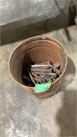 Bucket of railroad ties, nails