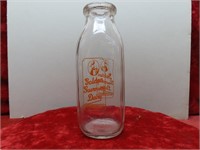Golden Guernsey Dairy milk bottle.