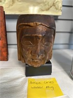 Antique carved wooden mug