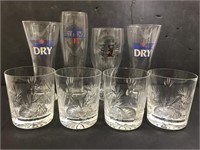 Four pinwheel crystal glasses and four beer