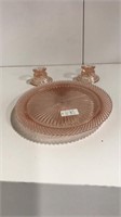Pink depression glass cake plate and candle