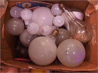 Box of vintage light bulbs and more