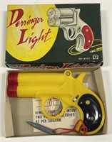 Vintage Derringer Pistol Light In Box
Made in