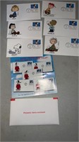 Snoopy postage stamps and envelopes