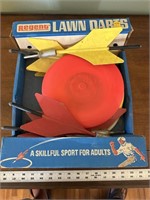 Vintage lawn darts and frisbees