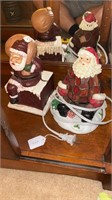 Two Santa Figurines