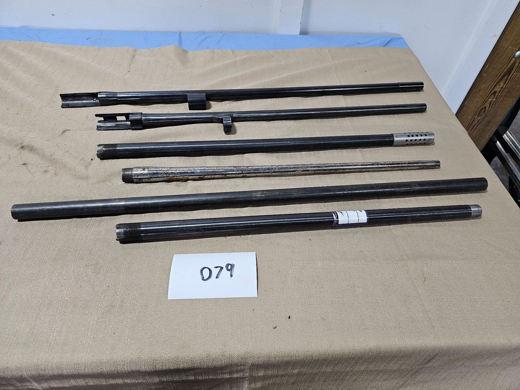 6 long gun barrels