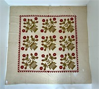 Appliqued quilt, flower baskets, reds & brown