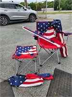 2 flag camping chairs, stool and umbrella.  Look